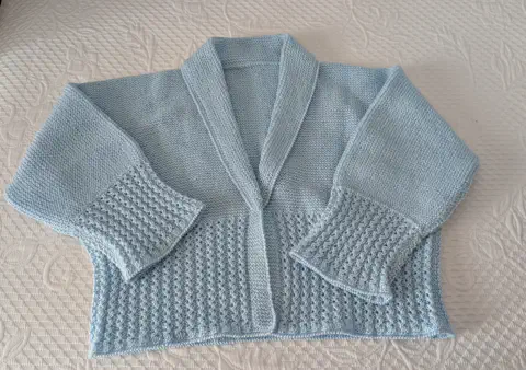 Jerseys y chalecos de punto hechos a mano para adultos.